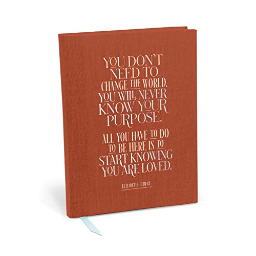 Red journal with white text: “You Are Loved” by Elizabeth Gilbert.