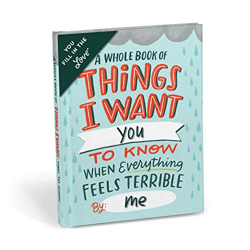 Light blue journal with colorful text reading "Things I Want You To Know.