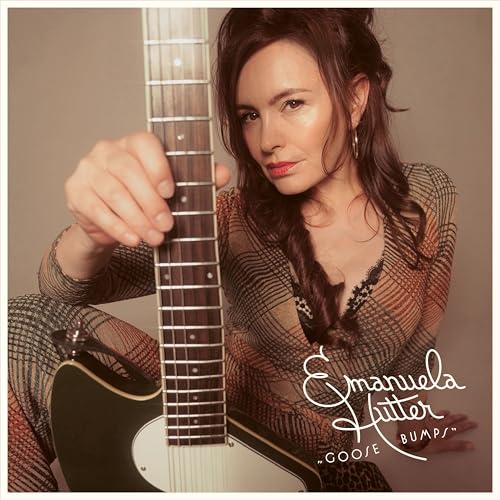Emanuela Hutter posing with an electric guitar on the Goose Bumps album cover.