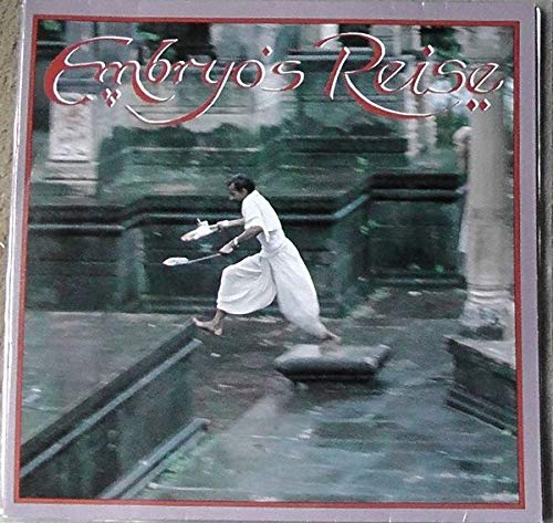 Album cover: man in white mid-air with a plate, steps background.