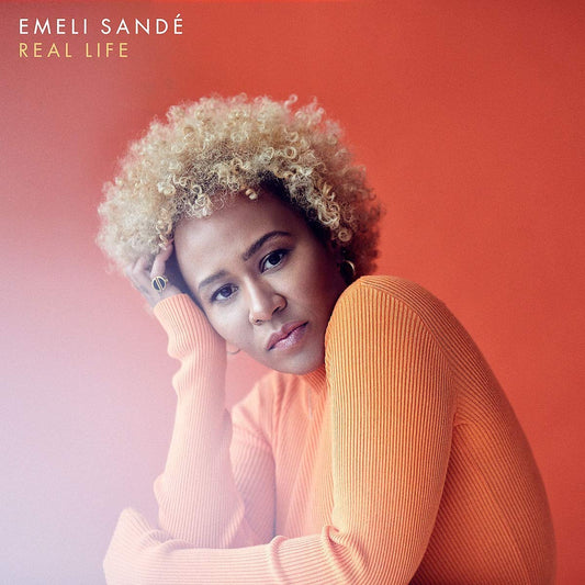"Album cover featuring Emeli Sandé with curly blonde hair against a red gradient background."