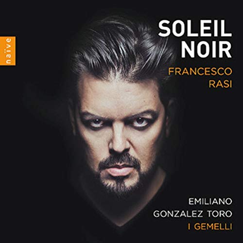 CD cover featuring a close-up portrait of Emiliano Toro, dark and dramatic.