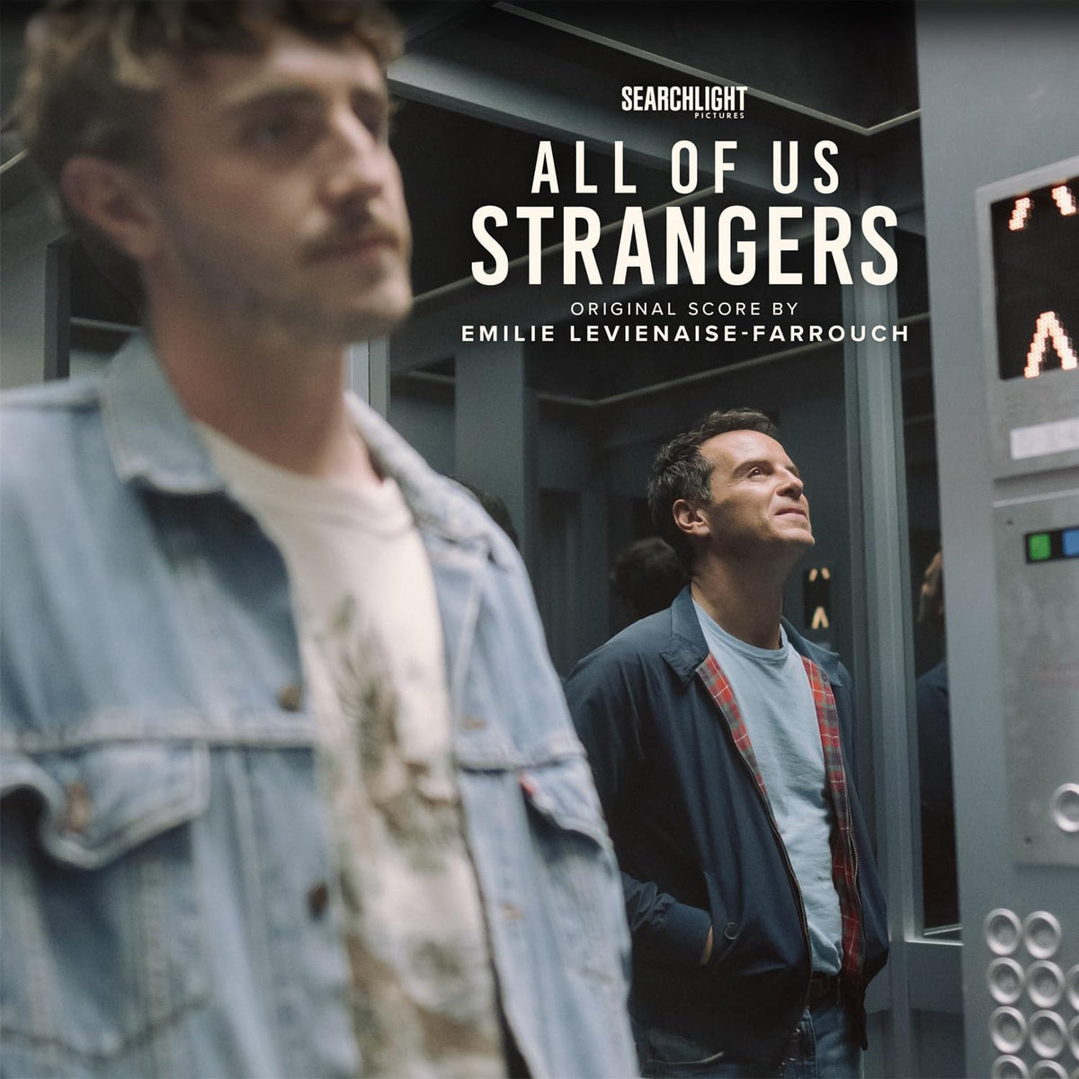 Two men stand in an elevator on the All of Us Strangers vinyl cover.