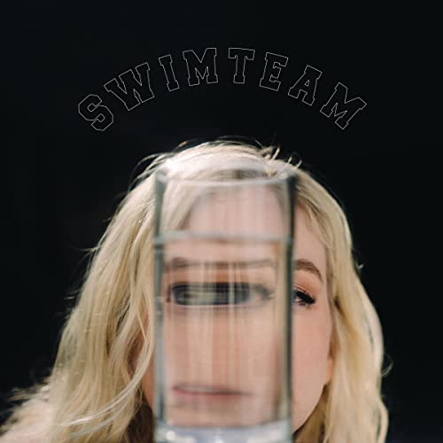 Album cover for Emily Kinney’s “Swimteam” featuring a woman and glass of water.