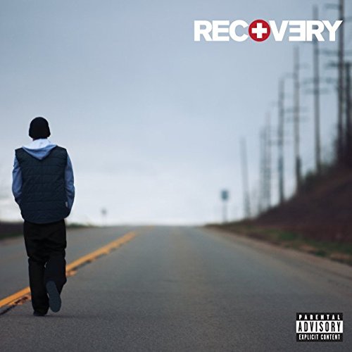Eminem walking away down a road with the album title Recovery at the top.