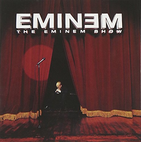 Album cover for Eminem’s “The Eminem Show” with red curtains and a microphone.