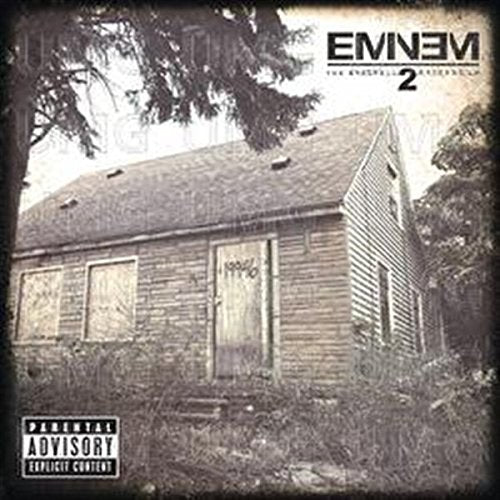 Eminem's "The Marshall Mathers LP 2" CD cover featuring a dilapidated house.