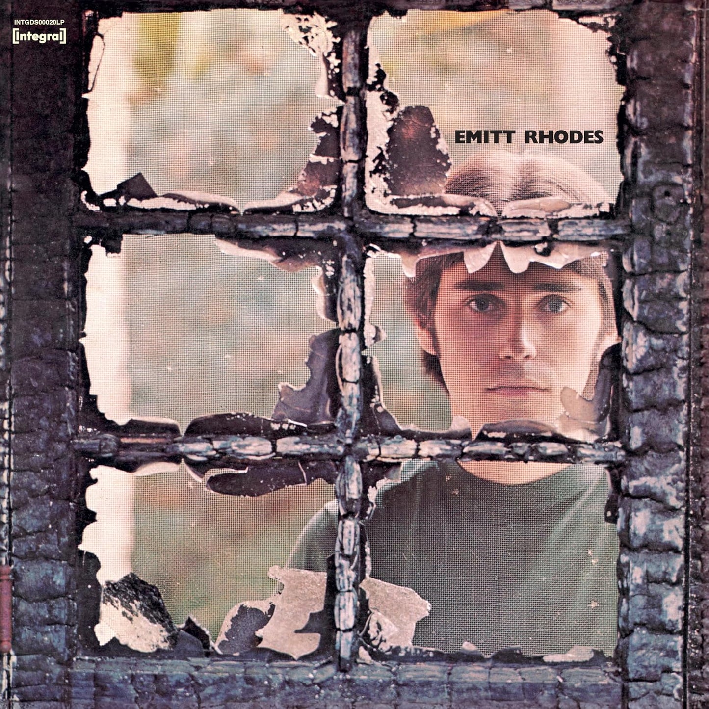 AlbumCLSCSTCSSS album cover featuring a man's face seen through a charred window.