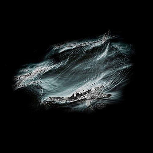Dark, abstract album cover with swirling blue and gray textures.