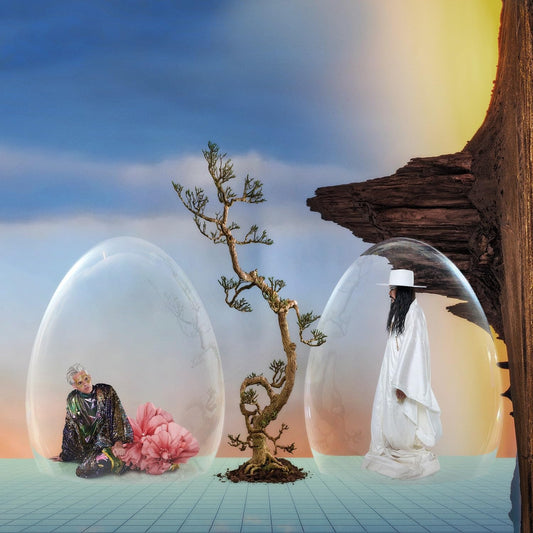 Album cover for Empire Of The Sun’s “Ask That God” featuring two figures in bubbles.