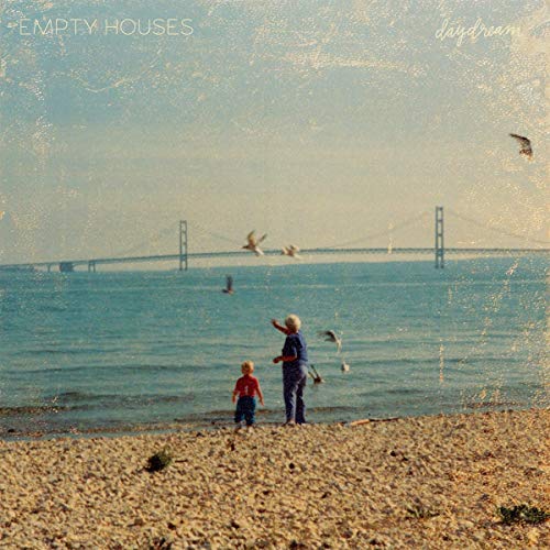 CD cover: child and adult on beach, bridge and birds in distance.