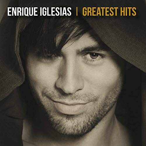Enrique Iglesias album cover, close-up portrait with a hooded shadow.
