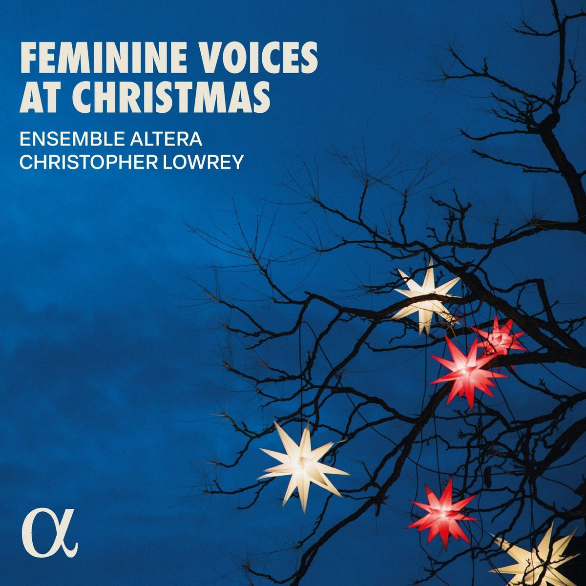 CD cover for "Feminine Voices At Christmas" with snowy branches and stars.
