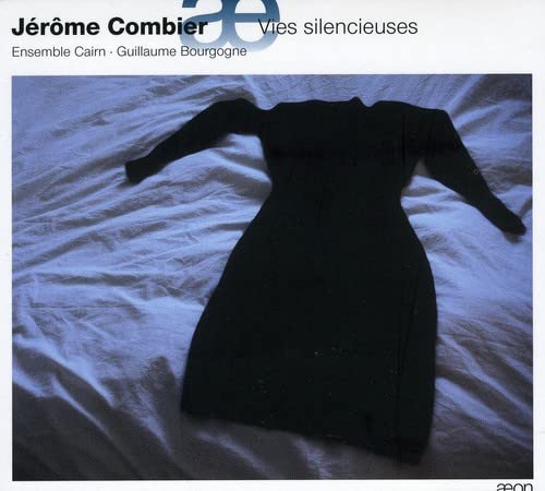 CD cover with a black dress draped on a white, rumpled bedsheet.
