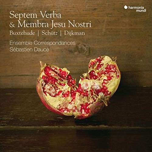 CD cover: broken pomegranate on a woodgrain surface, text overlay.