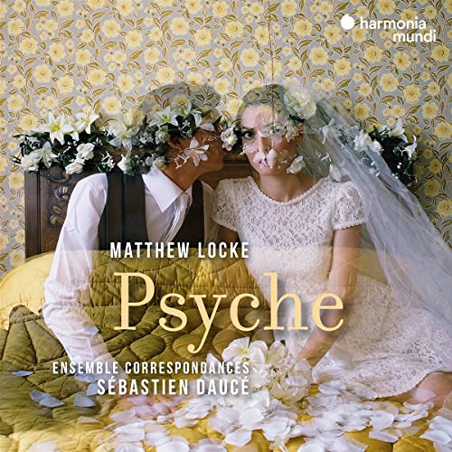 CD cover: couple with floral headpieces in a patterned room.