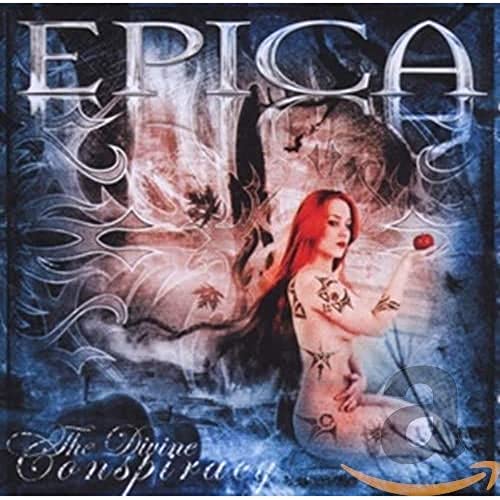 Album cover featuring a tattooed red-haired woman holding an apple against a blue background.