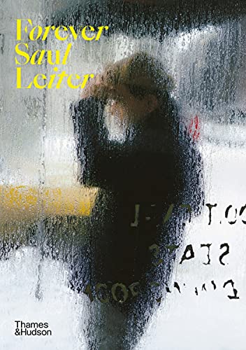 Book cover showing a person viewed through a rain-streaked window with yellow text overlay.