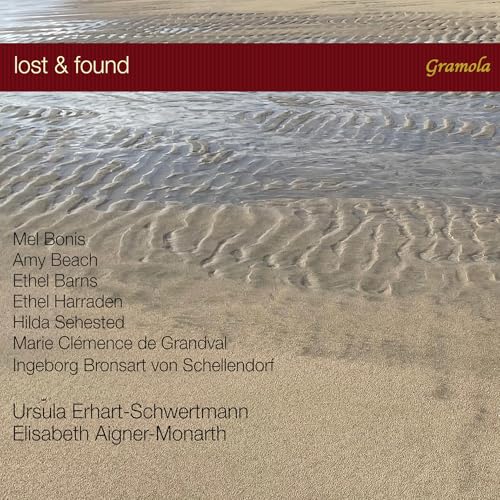 CD cover with rippled sand texture and red title bar: "lost & found".