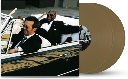 Eric Clapton and B.B. King in a classic car, vinyl record beside.