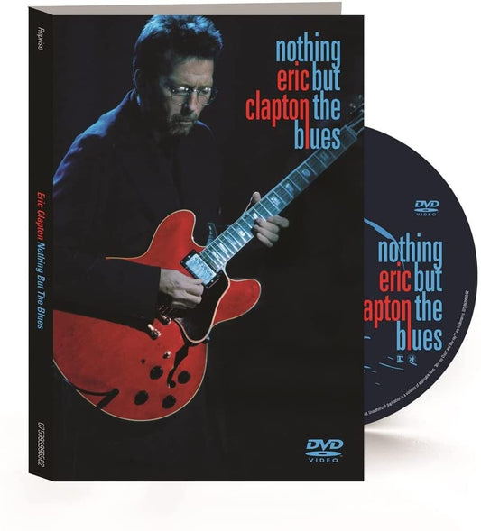 Eric Clapton DVD case with a man playing a red guitar on the cover.