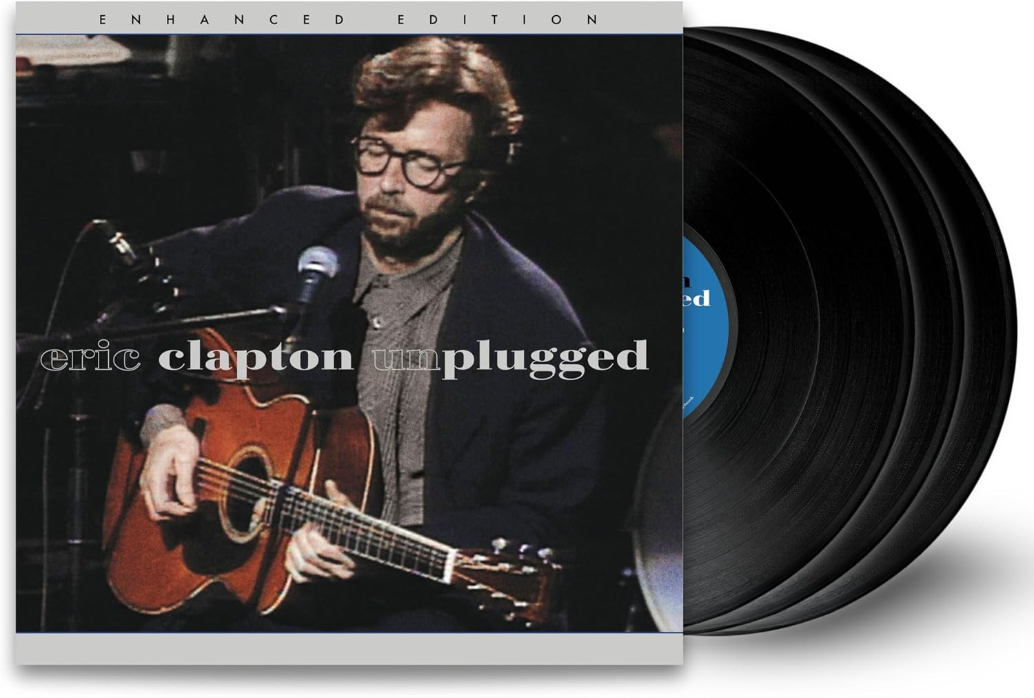 Eric Clapton's *Unplugged* album, vinyl record with cover art.