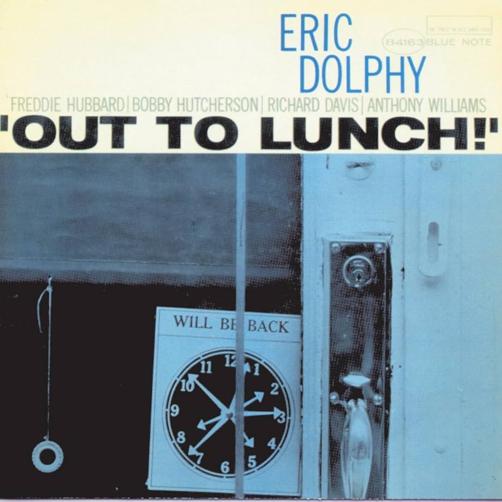 Album cover for Eric Dolphy’s “Out To Lunch” featuring a clock and scooter.