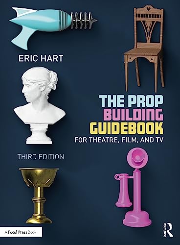 Book cover featuring props: a ray gun, chair, bust, and goblet.