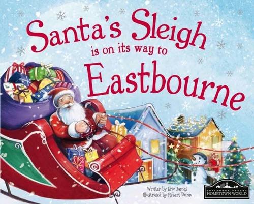 Santa in a sleigh flying over houses towards Eastbourne, book cover.