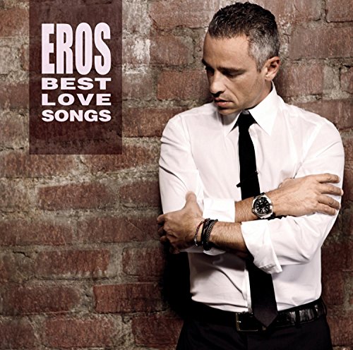 Eros Ramazzotti album cover: artist in white shirt against brick wall.