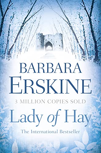 Book cover with a ruined castle in a misty, wintry forest.