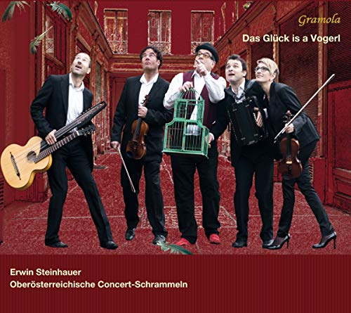 CD cover: Five musicians with instruments and a birdcage pose outdoors.