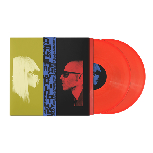 Erykah Badu album "Before the World Blows" with orange vinyl records.