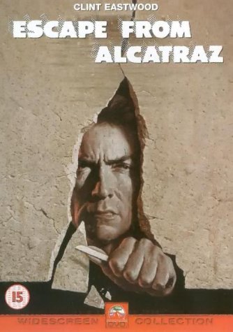 Clint Eastwood peering through a cracked concrete wall on the Escape From Alcatraz DVD cover.