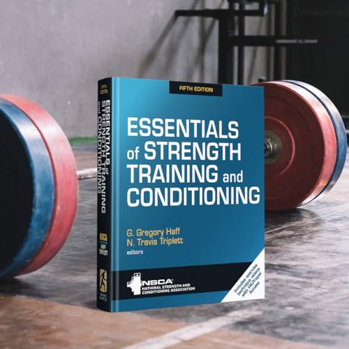 Blue textbook, “Essentials of Strength Training and Conditioning,” with weight plates.