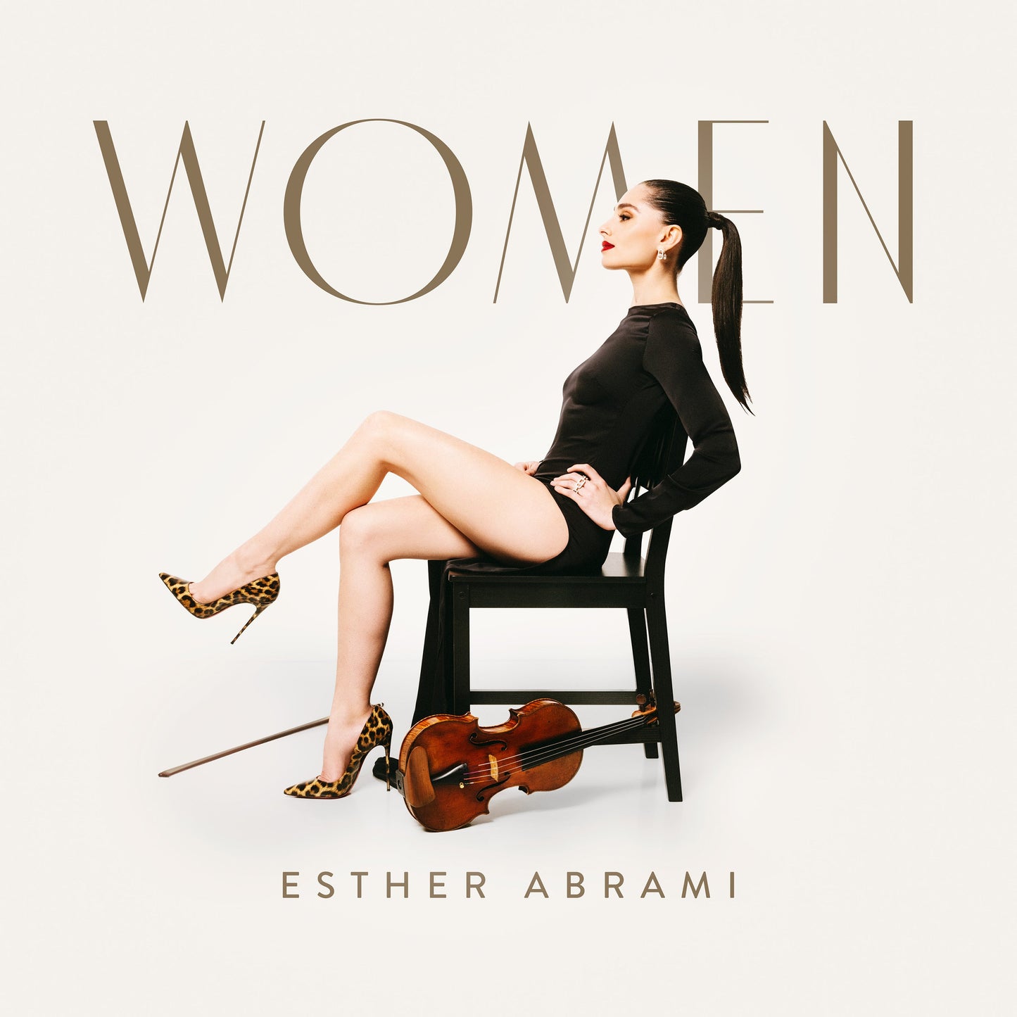 Woman with cello on chair, album cover for "Women" by Esther Abrami.