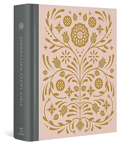 Tan and black Bible with gold floral design on the cover.