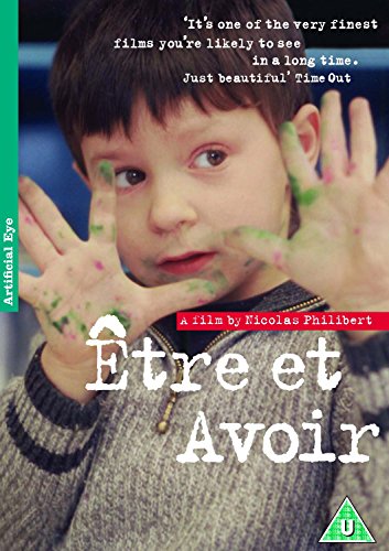 DVD cover for “Etre Et Avoir” featuring a young boy with paint on hands.