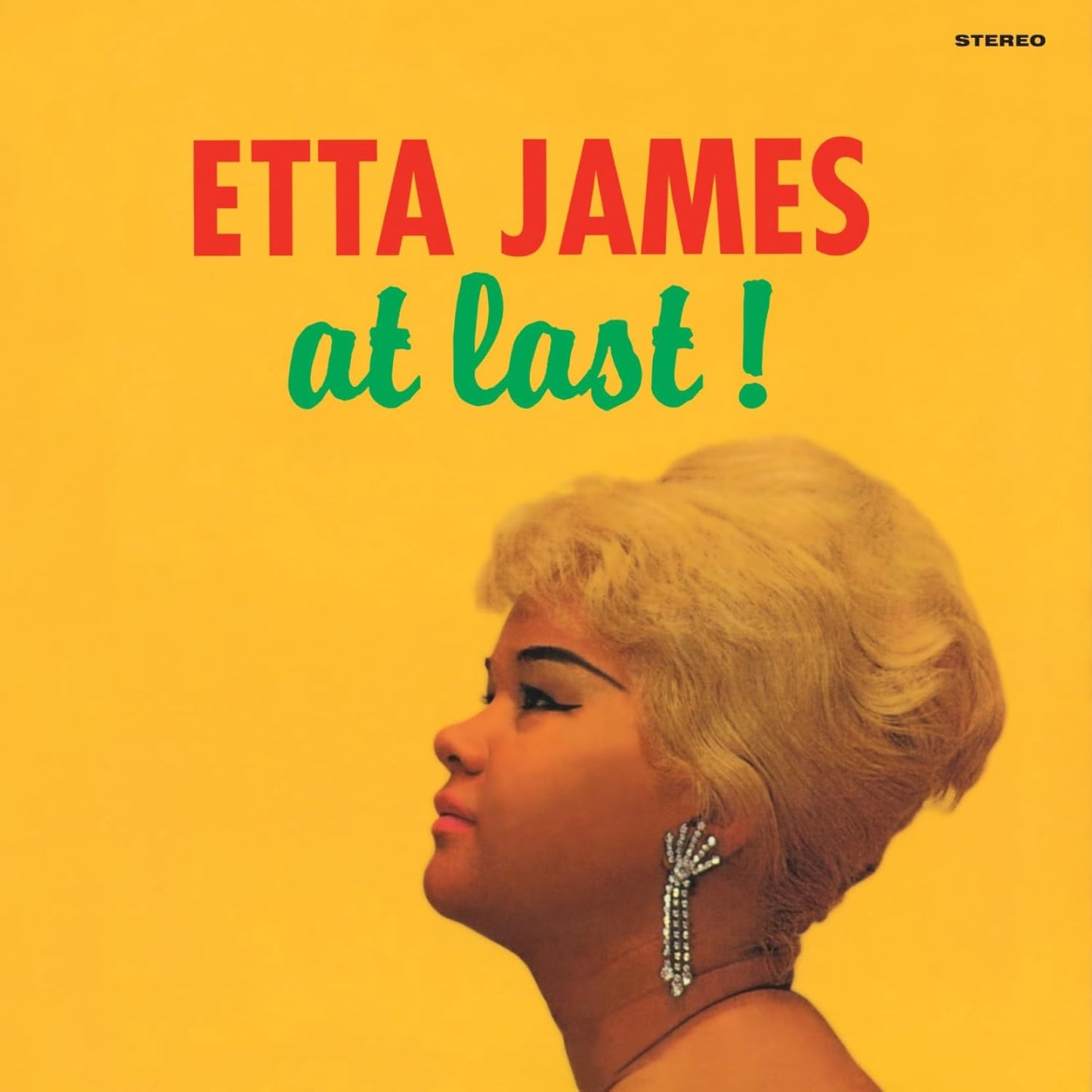 Album cover for Etta James At Last featuring her profile on a yellow background.