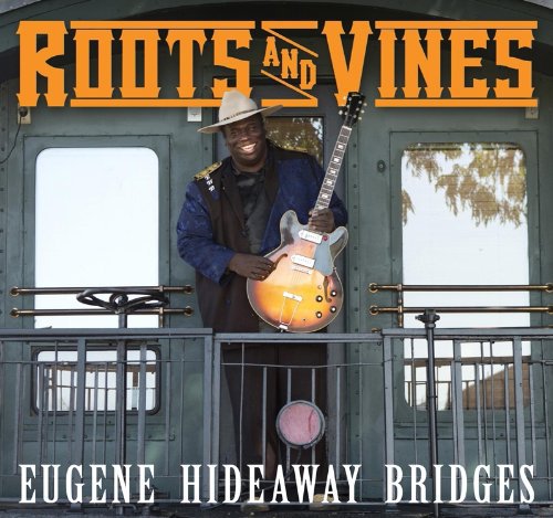 Eugene Hideaway Bridges with guitar, album cover "Roots And Vines".