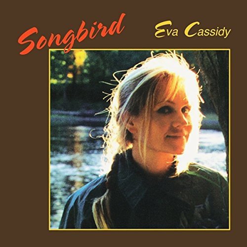 Brown album cover with a photo of a blonde woman outdoors, titled "Songbird Eva Cassidy".
