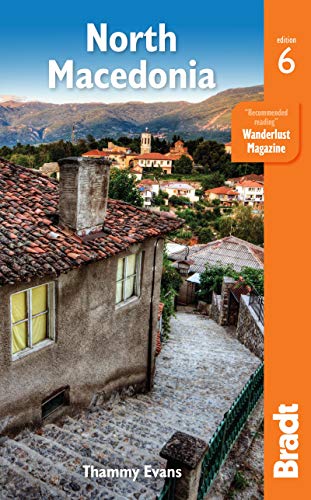 Book cover for North Macedonia travel guide featuring a stone house and cobbled street.