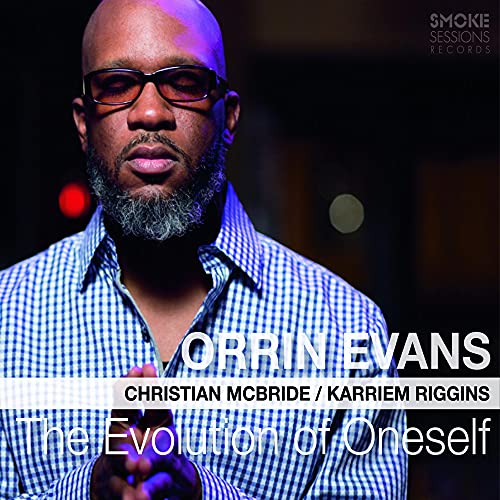CD cover featuring a portrait of Orrin Evans, a Black man with glasses.