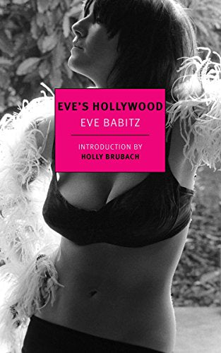 Black and white photo of a woman in a bra and feather boa.