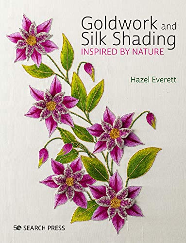 Book cover with embroidered purple flowers and green leaves.