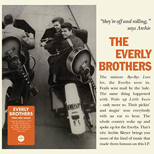 Album cover for The Everly Brothers, featuring three men with guitars.
