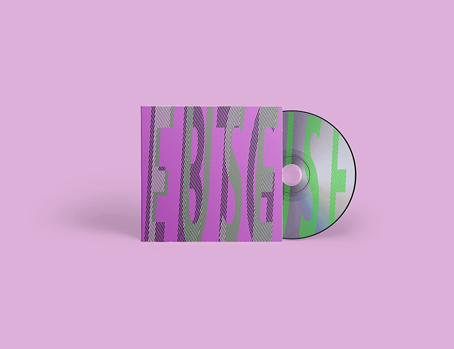 "CD case and disc with green and purple striped design on pink background."