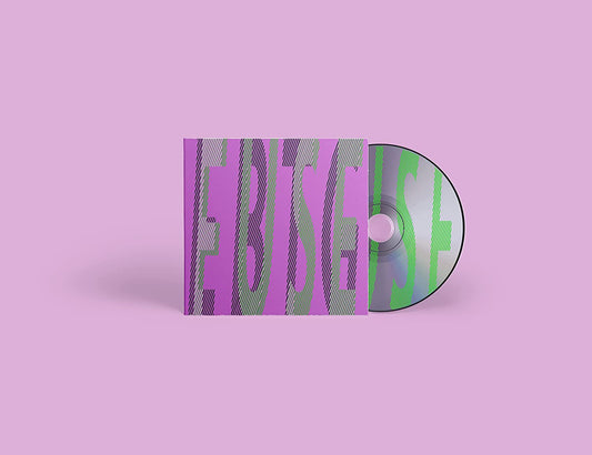 "CD case and disc with green and purple striped design on pink background."