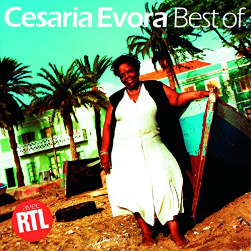 Cesaria Evora album cover featuring a woman by a blue boat.