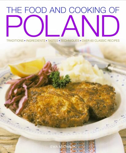 Plate of food with meat, vegetables, mashed potatoes, and lemon on a table.